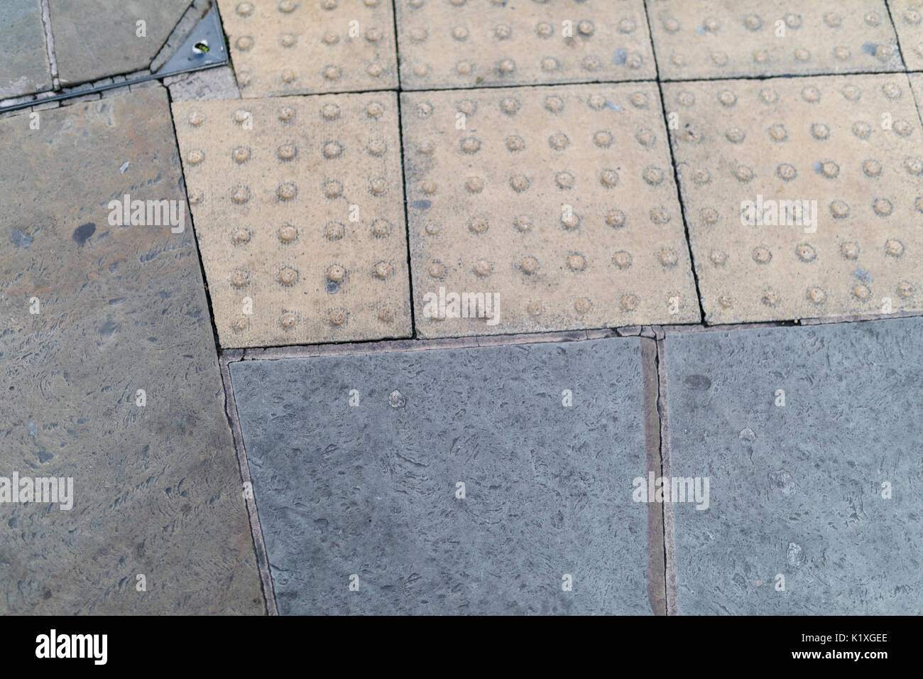 Bland, block paved pavement, urban setting background Stock Photo