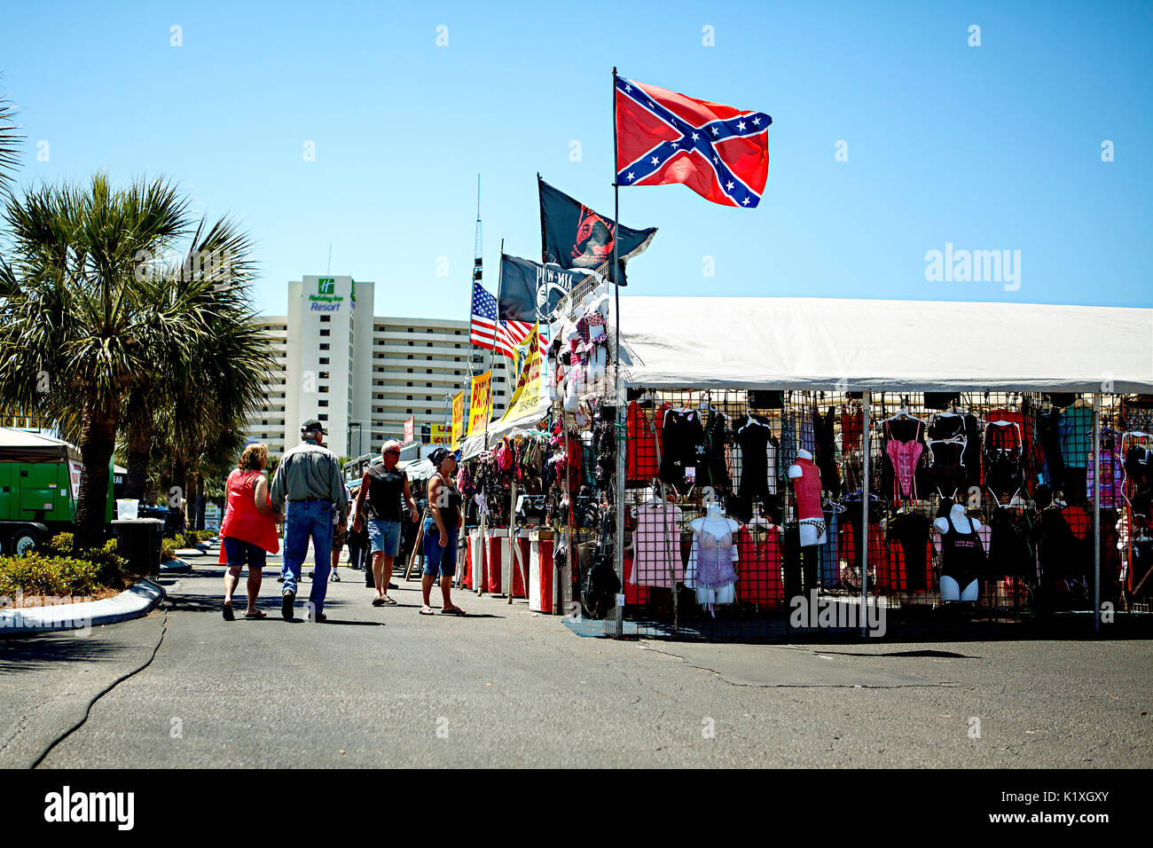 Confederate flag and other wares on sale at Thunder Beach Motorcycle Rally at Panama City Beach, Florida. Stock Photo