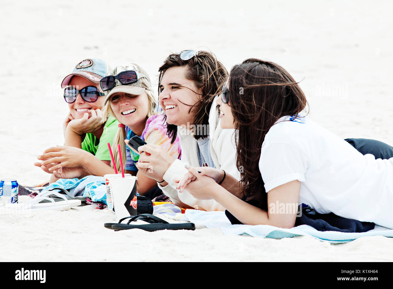 Panama City Beach, Florida. Spring break, 2011. Group of girls hanging out on the beach.. Stock Photo