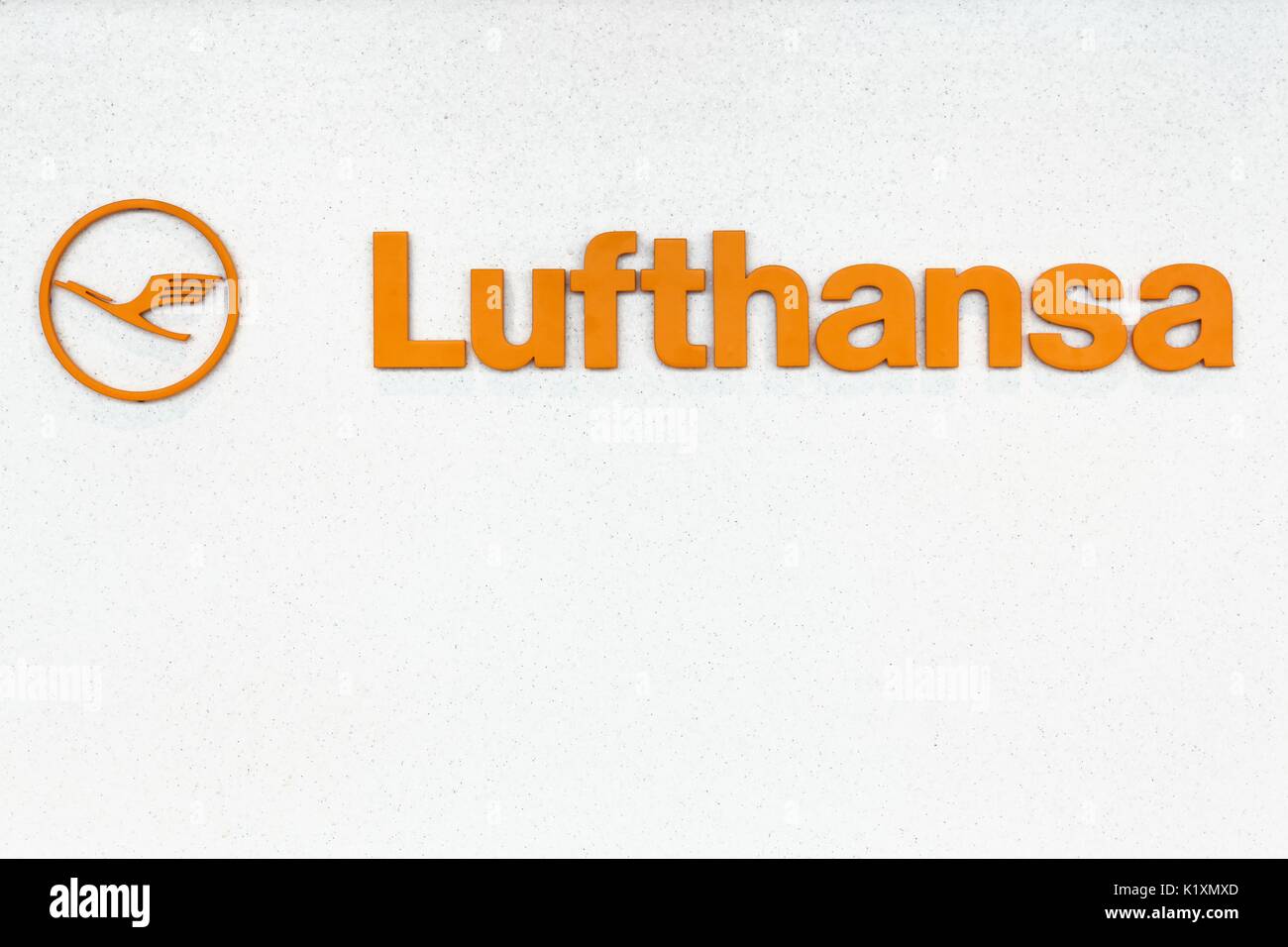 Frankfurt, Germany - July 30, 2017: Lufthansa logo on wall at Frankfurt airport.Lufthansa is a german airline and also the largest airline in Europe Stock Photo