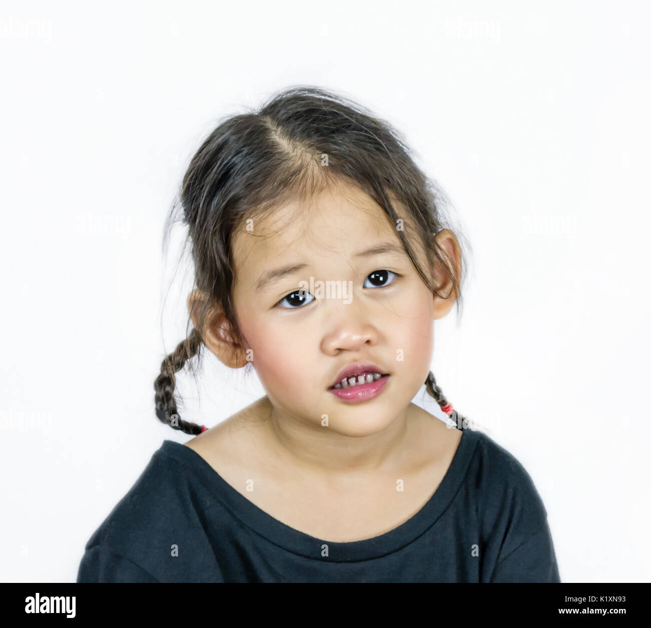 portrait of Asian little girl on white background Stock Photo