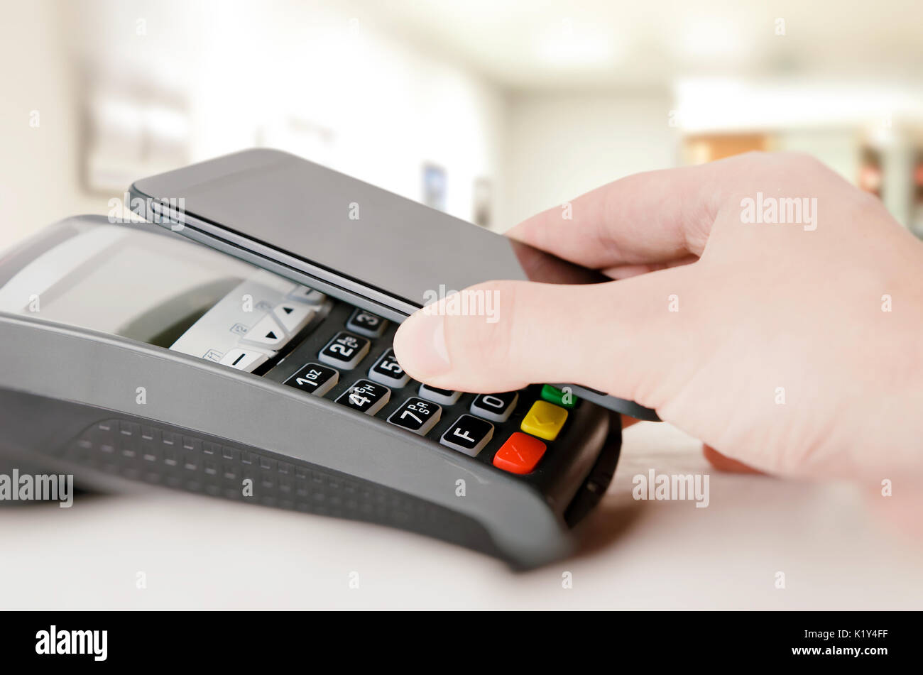 Mobile payment with smart phone. payment nfc near field communication phone credit card concept Stock Photo