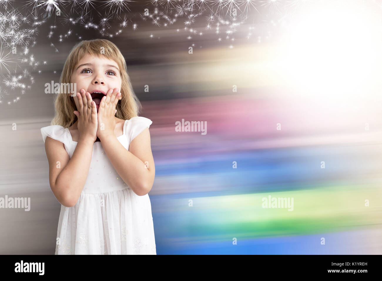 Portrait of surprised happy adorable little girl isolated Stock Photo ...