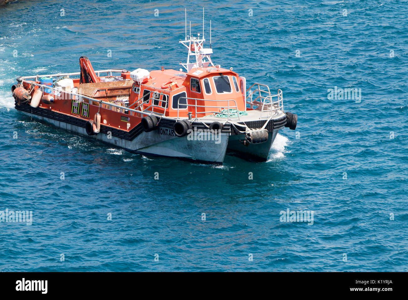 Montorik Off Shore Crew Vessel Gibunko's Crew boat tender in the port of Gibraltar in the Mediterranean Sea Stock Photo