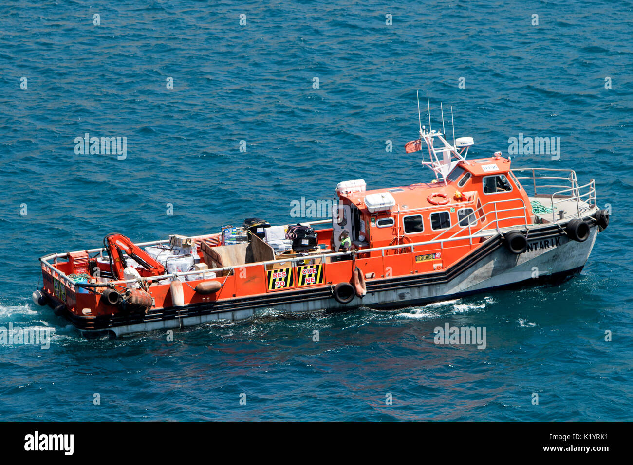 Montorik Off Shore Crew Vessel Gibunko's Crew boat tender in the port of Gibraltar in the Mediterranean Sea Stock Photo