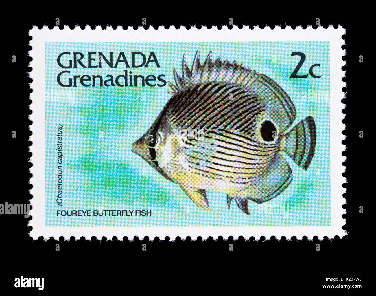 Postage stamp from Grenada Grenadines depicting a foureye butterfly fish (Chaetodon capistratus) Stock Photo