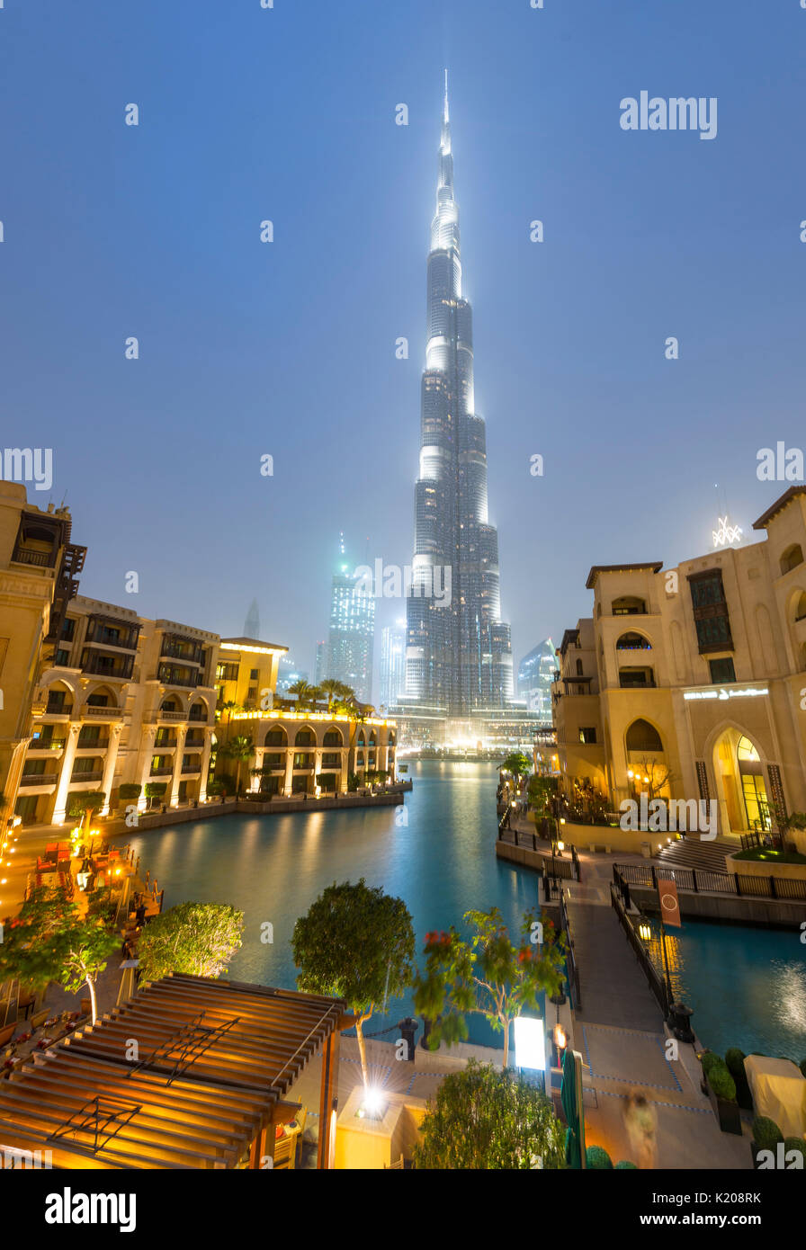 Burj Khalifa, artificial lake with lighted fountain, blue hour, Dubai, Emirate Dubai, United Arab Emirates Stock Photo