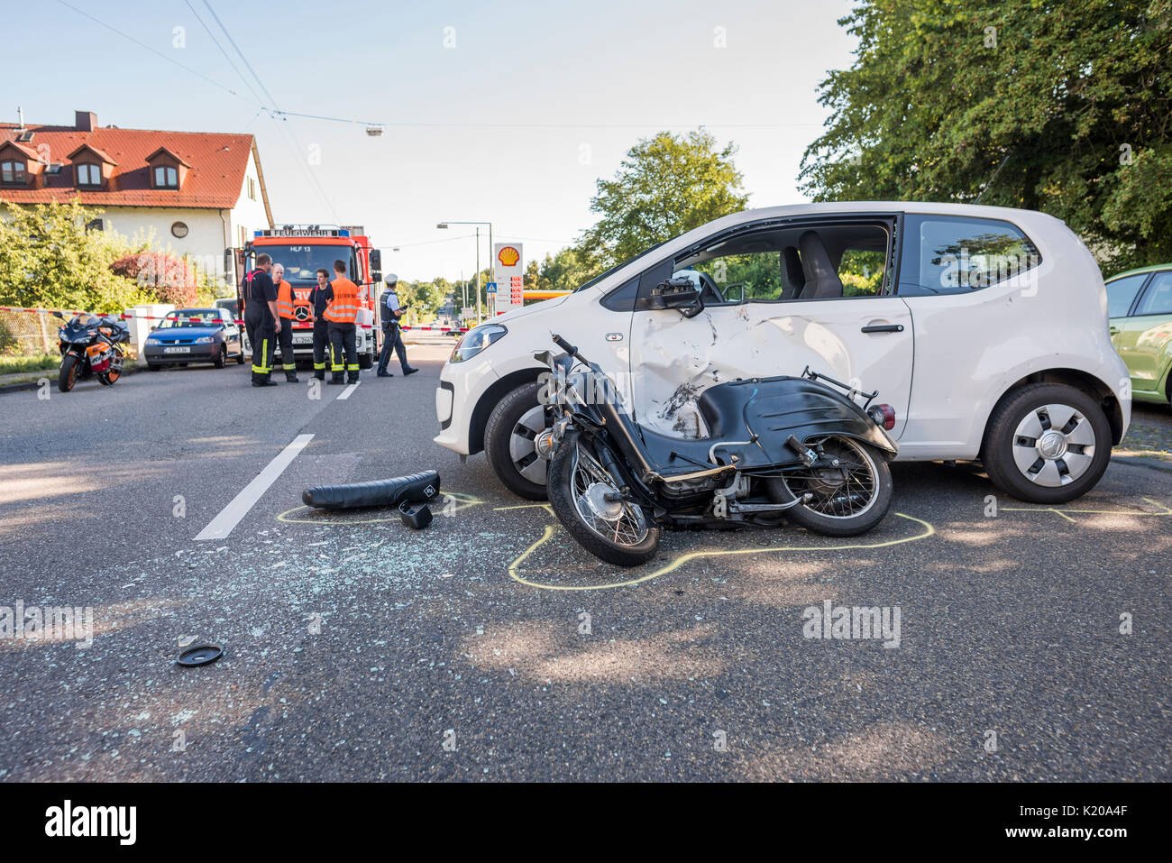 Heavy road accident, Simson scooter crashing in car, police recording accident, Germany Stock Photo