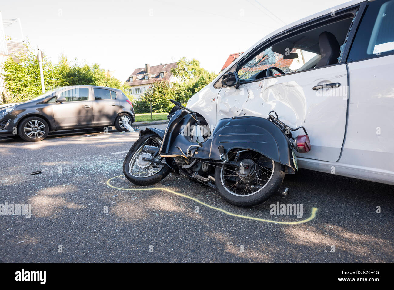 Heavy road accident, Simson scooter crashing in car, police recording accident, Germany Stock Photo