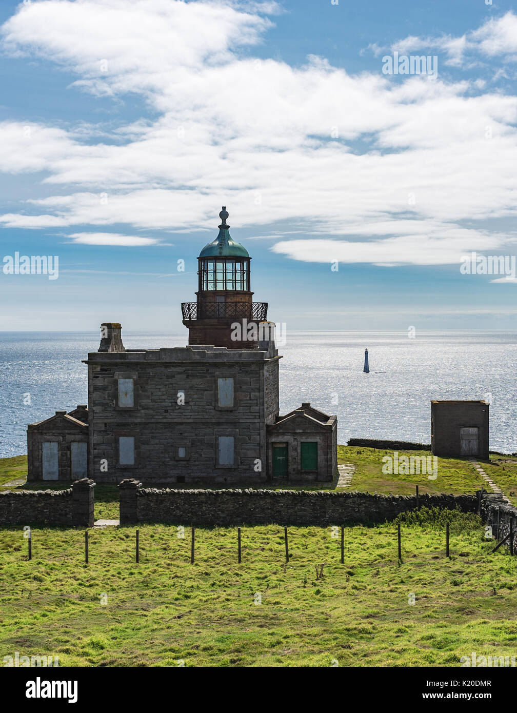 View of Lower Lighthouse buildings and Chicken Rock Lighthouse on Calf
