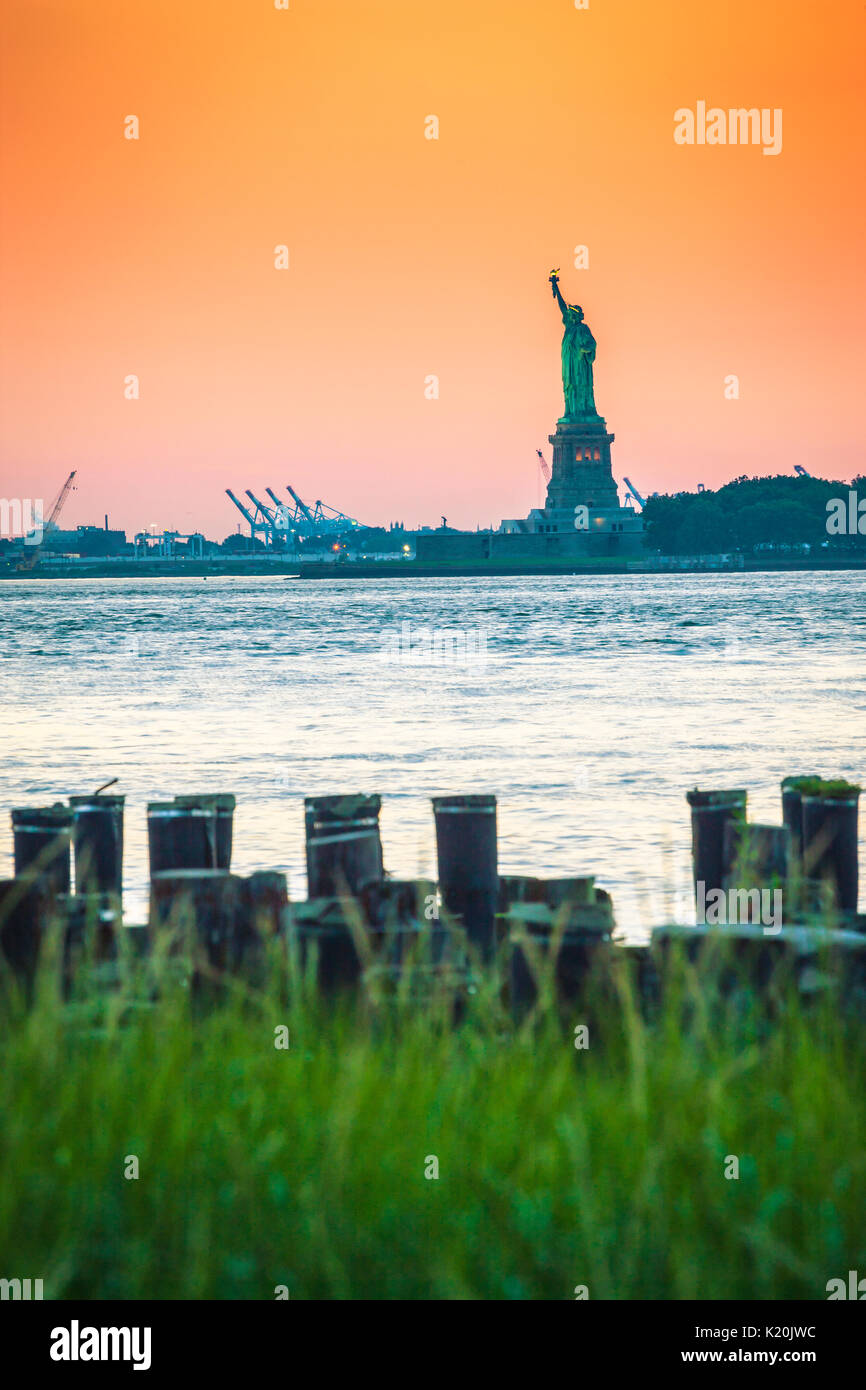 Statue of Liberty at sunset, New York City Stock Photo