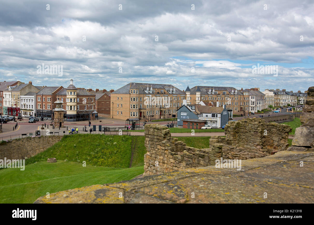 Coastal town of Tynemouth viewed from ruins of historic castle, England Stock Photo