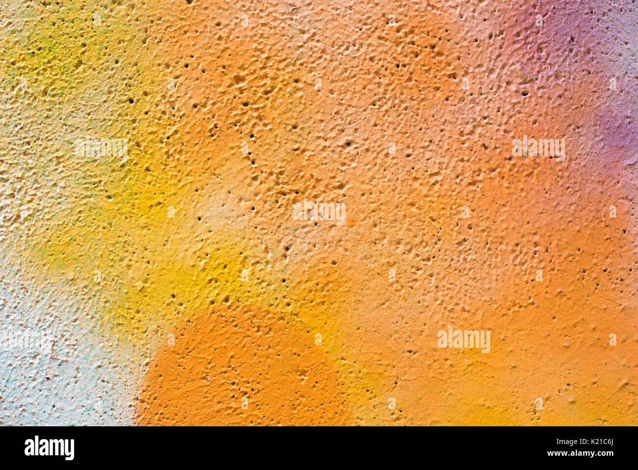 orange color painted wall texture background - detail of graffiti Stock Photo