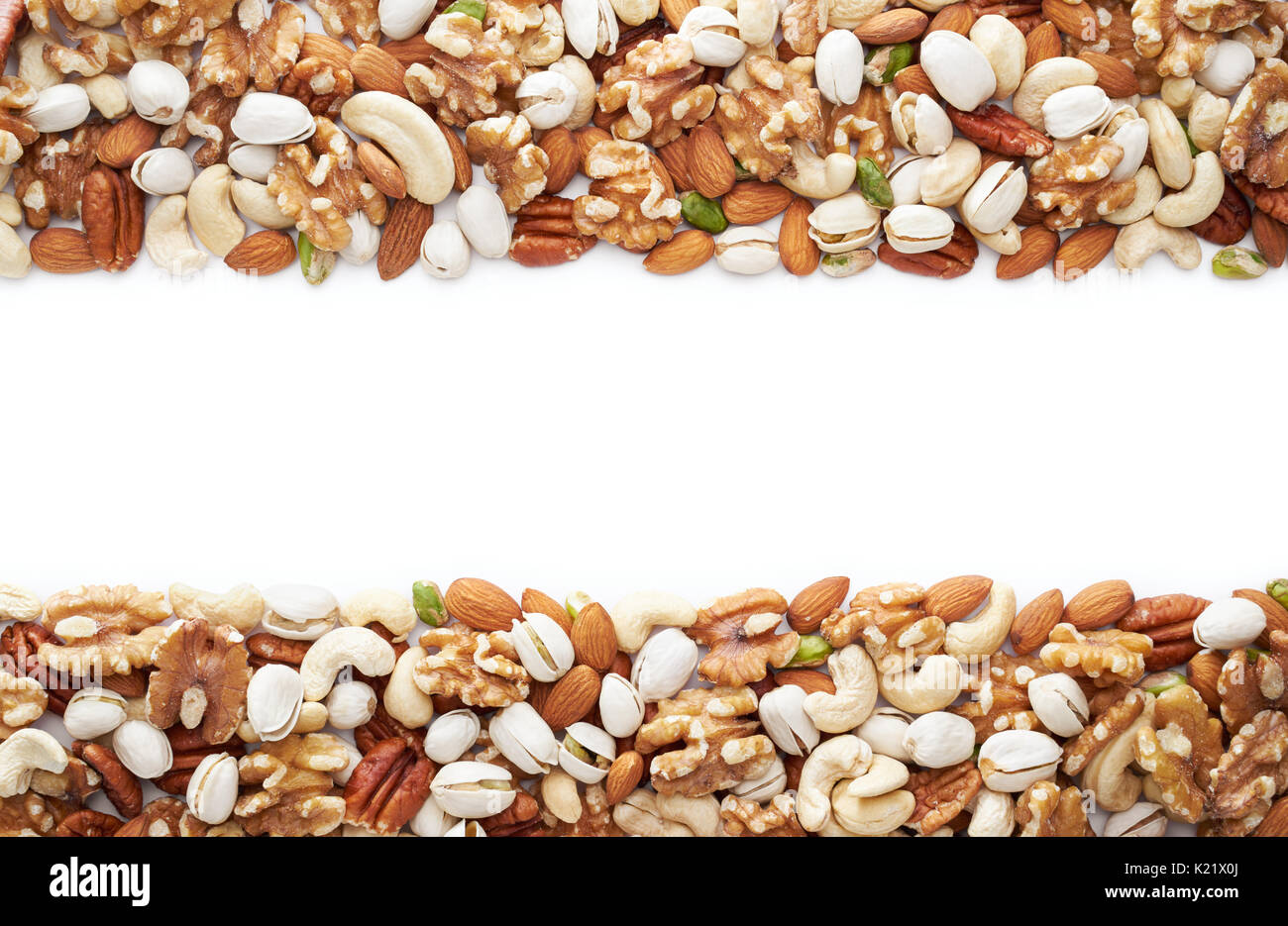 Healthy nuts over white background with copy space Stock Photo