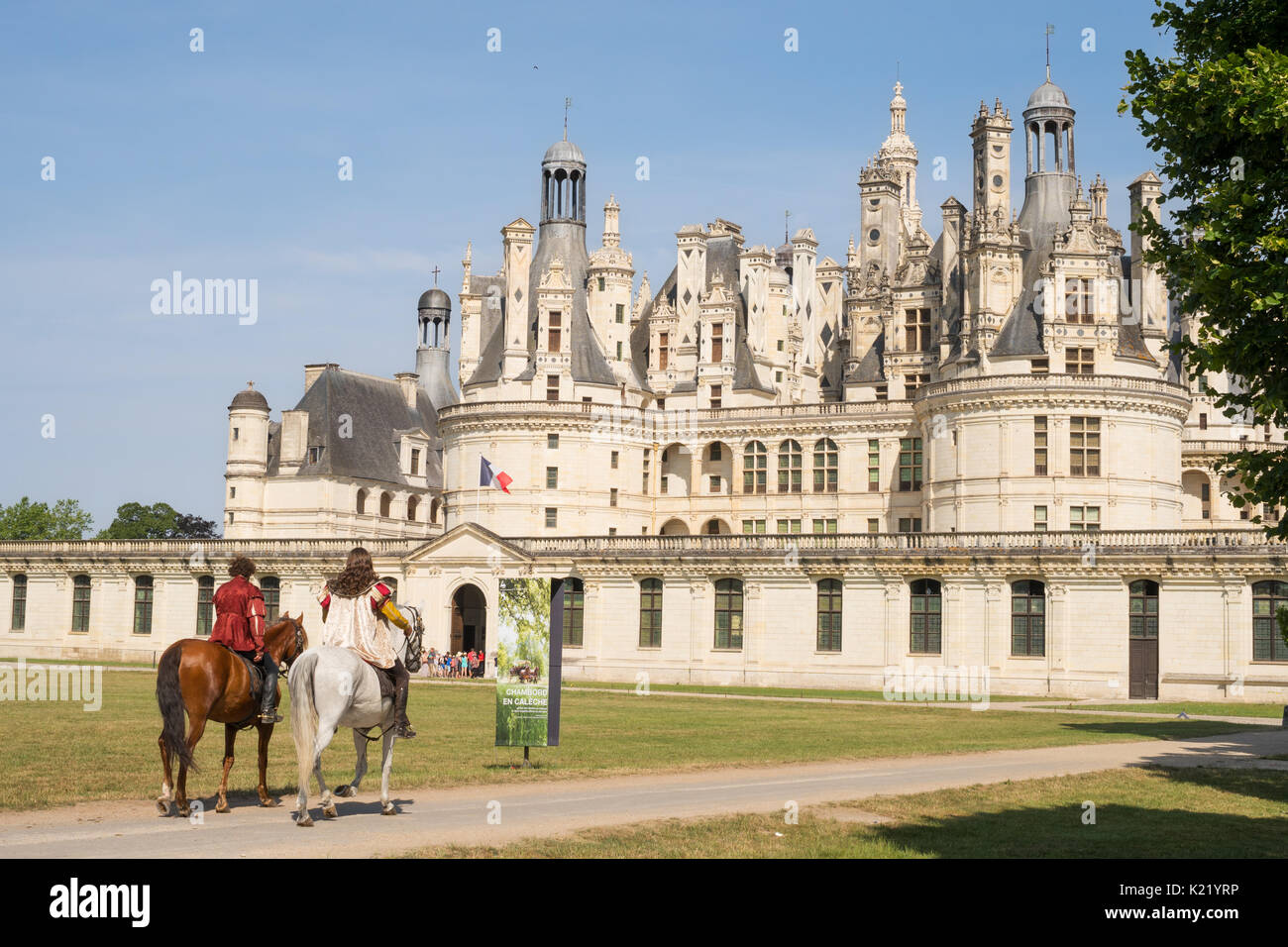 Reenactors on horseback at the south facade Château de Chambord, Loir-et-Cher, France, Europe Stock Photo