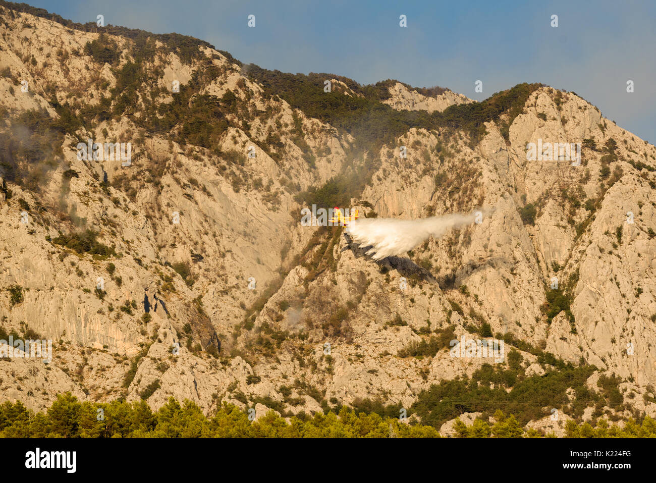 Promajna, Biokovo, Croatia, 24. August 2017 - Firefighting on Biokovo by Canadair CL-415 water bomber amphibious plane near most popular tourist desti Stock Photo