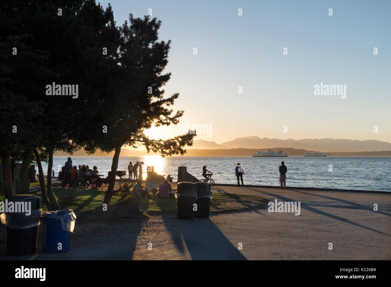 View of Puget Sound and Olympc Mountains from Alki beach, Seattle, Washington, USA Stock Photo