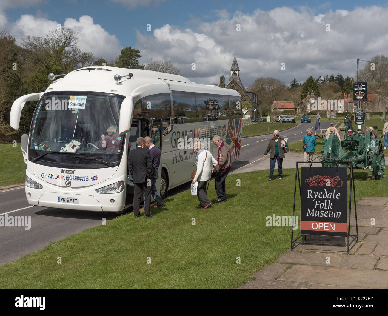 Day trippers boarding a bus home outside the Ryedale Folk Museum at Hutton le Hole Stock Photo