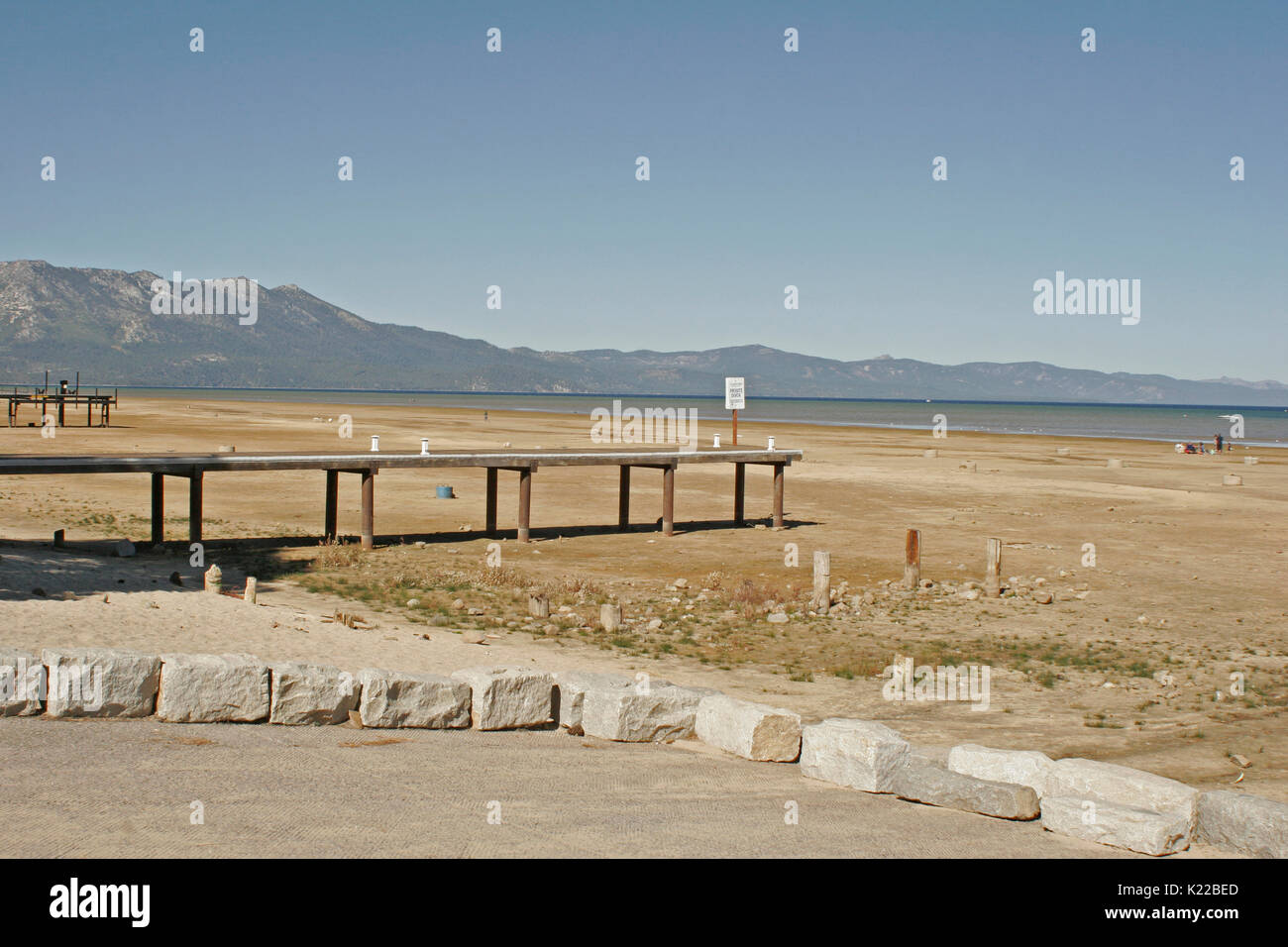 LAKE TAHOE PRIVATE DOCK AND BOAT RAMP ON DRY LAND DURING DROUGHT, CALIFORNIA Stock Photo