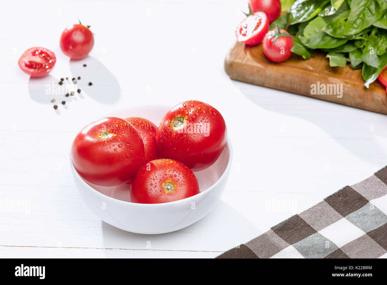 The fresh tomatos on white background Stock Photo - Alamy