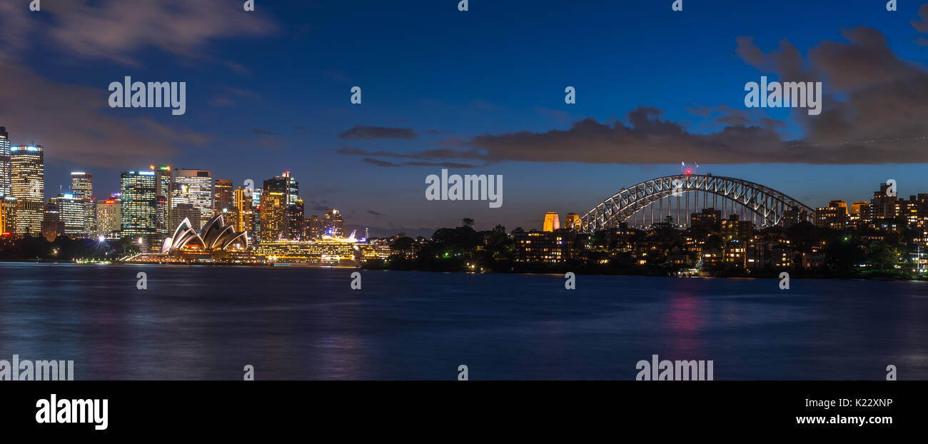 Panoramic views of Sydney harbour including Opera house, bridge and CBD, seen from Cremorne point on north shore, Sydney, New South Wales, Australia. Stock Photo