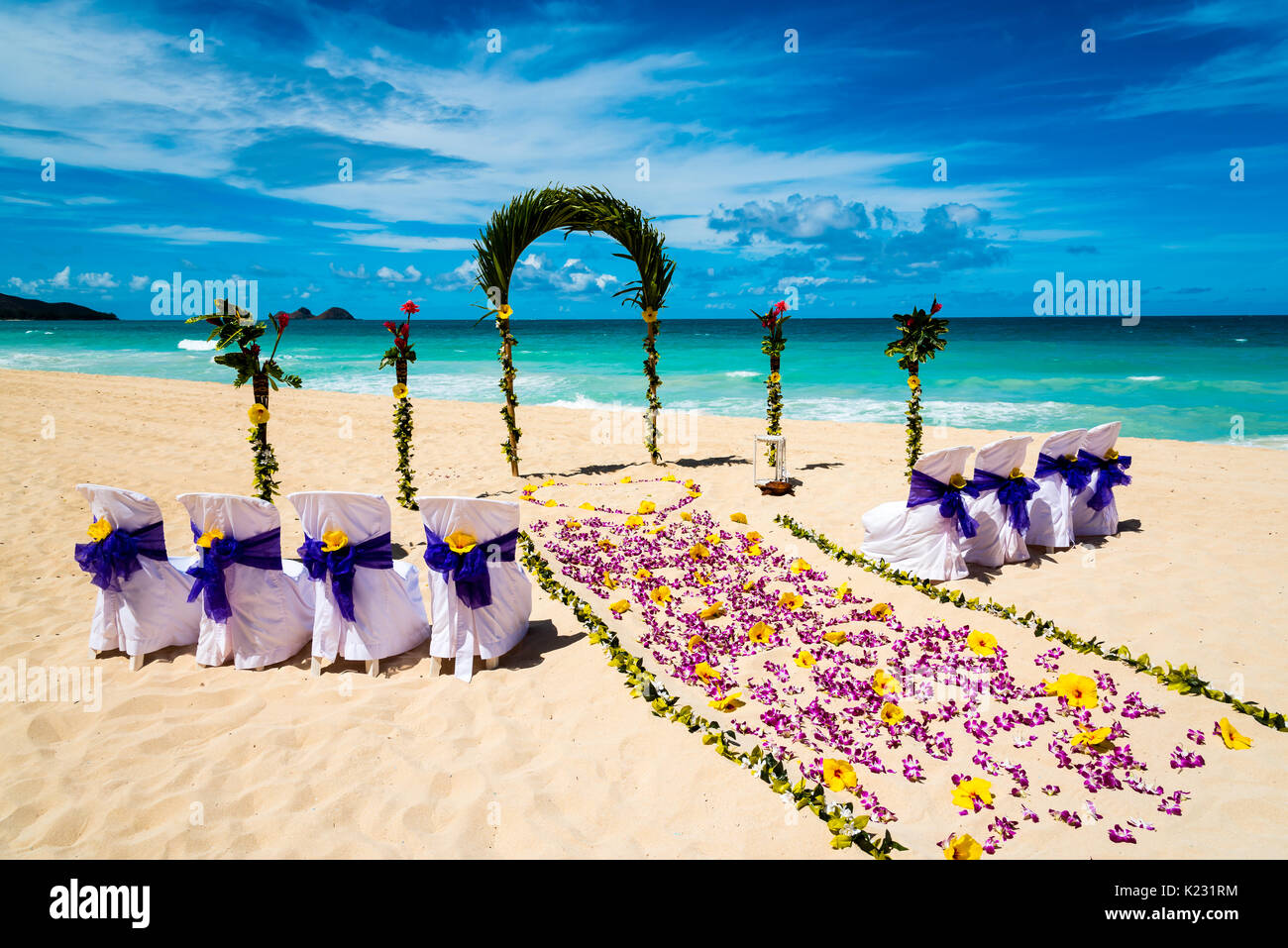 Wedding ceremony setup on a beach in Hawaii Stock Photo