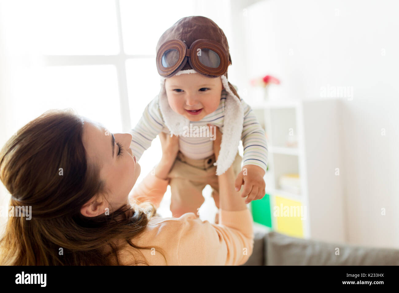 baby wearing pilot hat 