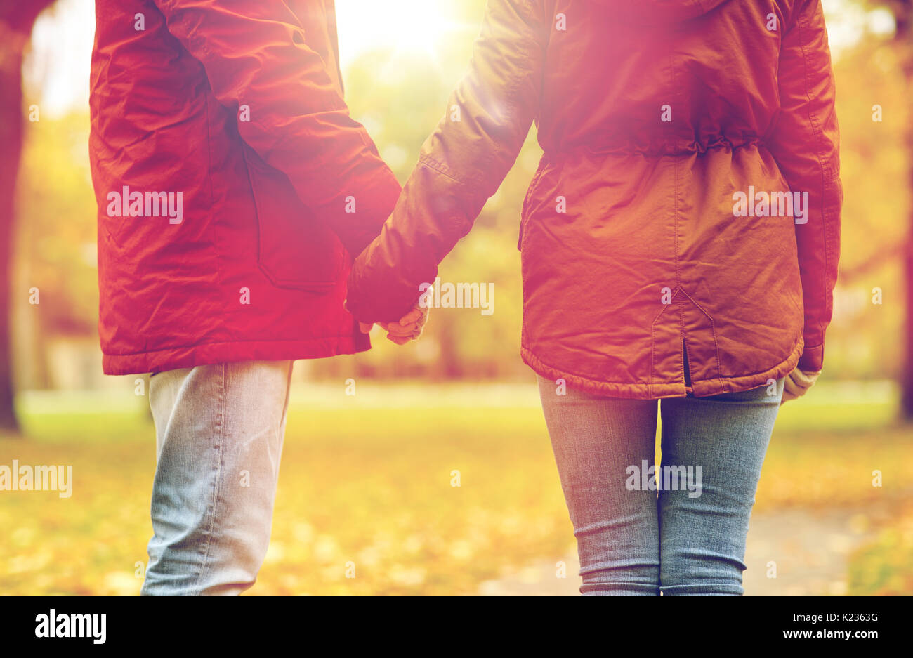 Teen couple walking holding hands hi-res stock photography and images ...