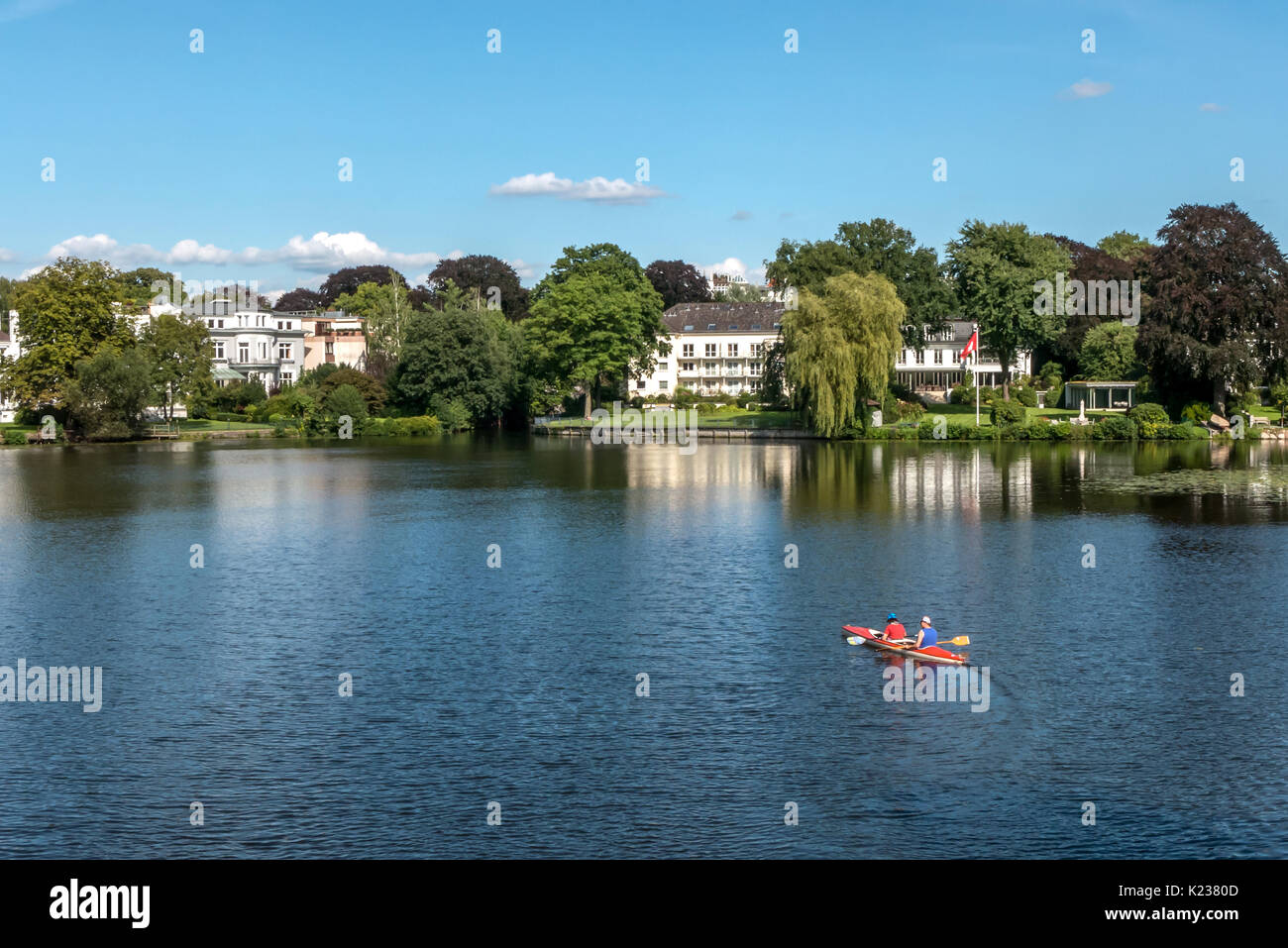 Canoeists and lakeside property in Hamburg, Germany Stock Photo Alamy
