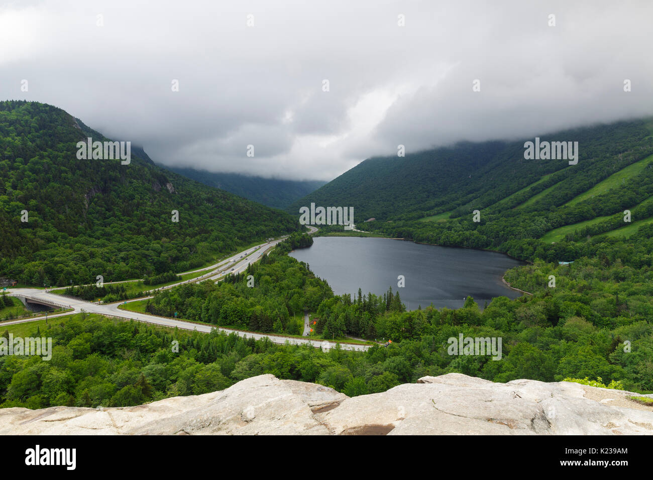 Clouds over Cannon Mountain in Franconia Notch State Park from Artists Bluff in the White Mountains, New Hampshire. Stock Photo