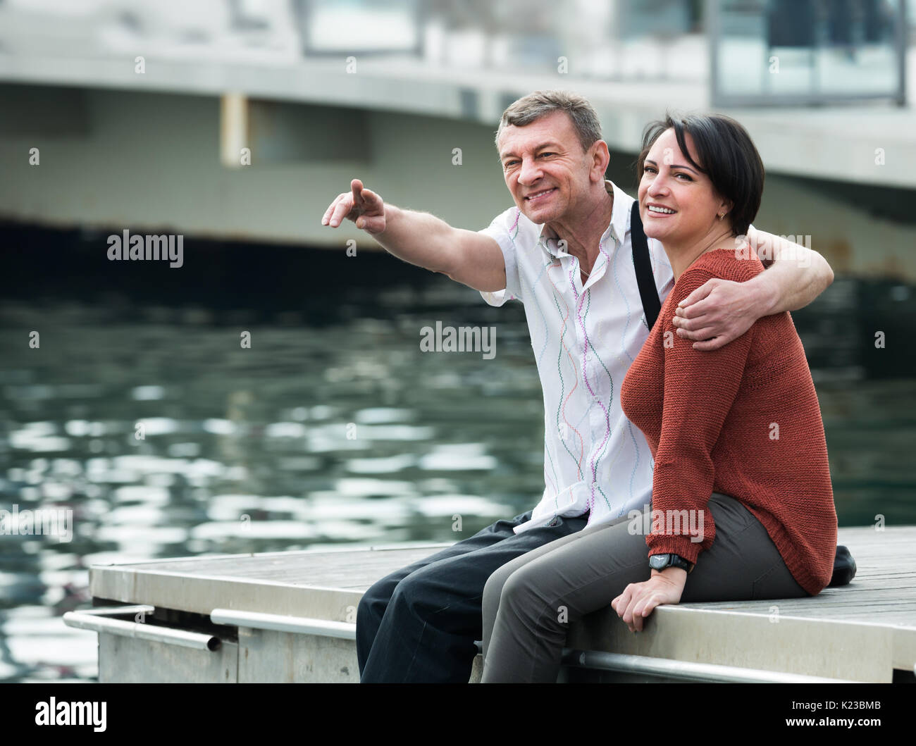 Mature couple posing on bridge hi-res stock photography and images - Alamy