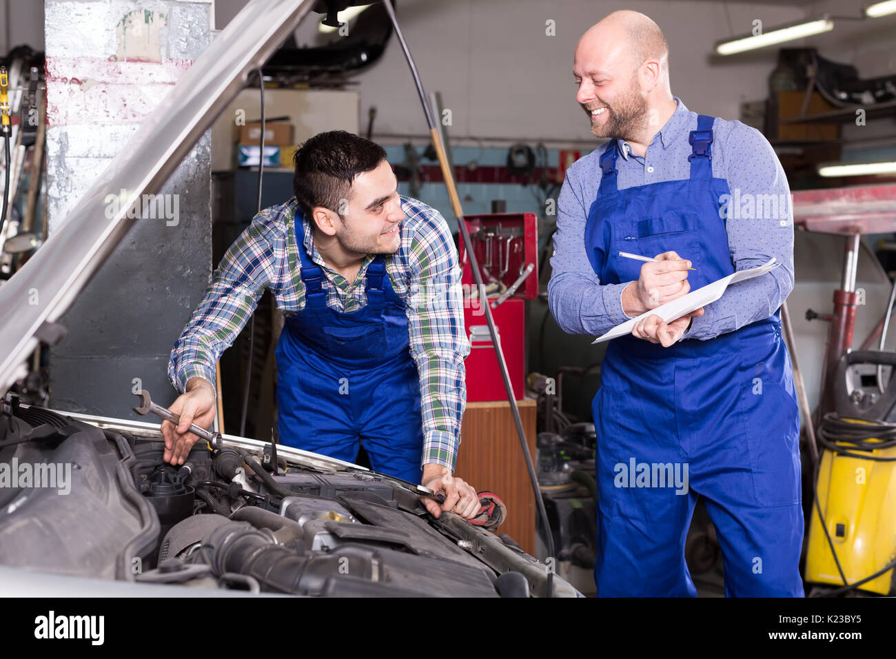 Car Repair Insurance >> Two Insurance Agents Are Measuring Loss At Car Repair Shop Car Repair Insurance >> Two Insurance Agents Are Measuring Loss At Car Repair Shop