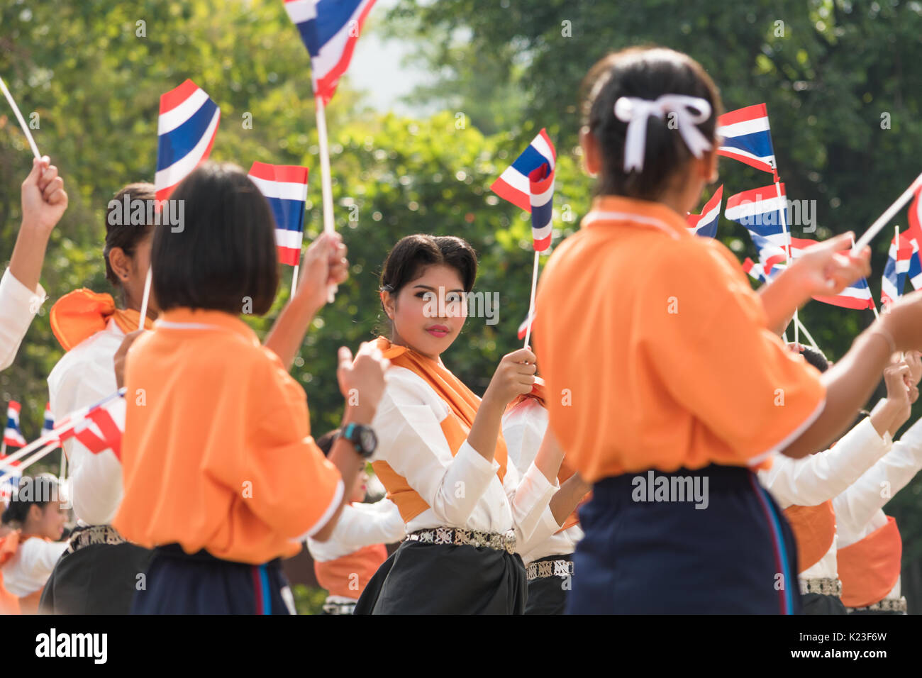 Isan, Thailand. 28th Aug, 2017. Thai government holds ceremony of 100th anniversary of current Thai's national flag. Thai students got involved in this ceremony to show their loyalty and salute to their nation. Credit: Pranee Sinayrurach/Alamy Live News Stock Photo