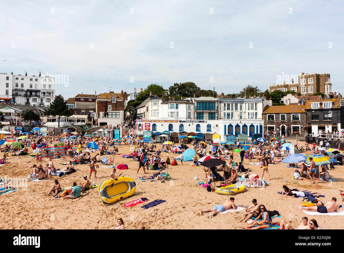 England, Viking Bay, Broadstairs. Beach totally packed with sunseekers