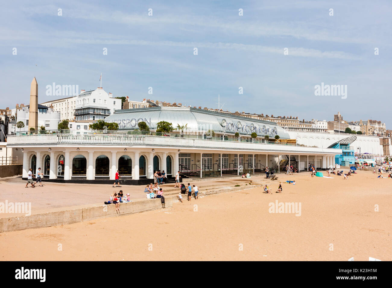 The Victorian Pavilion on the seafront at Ramsgate, restored by Weatherspoons into the largest pub in England. Beach view of the building. Daytime, blue sky. Stock Photo