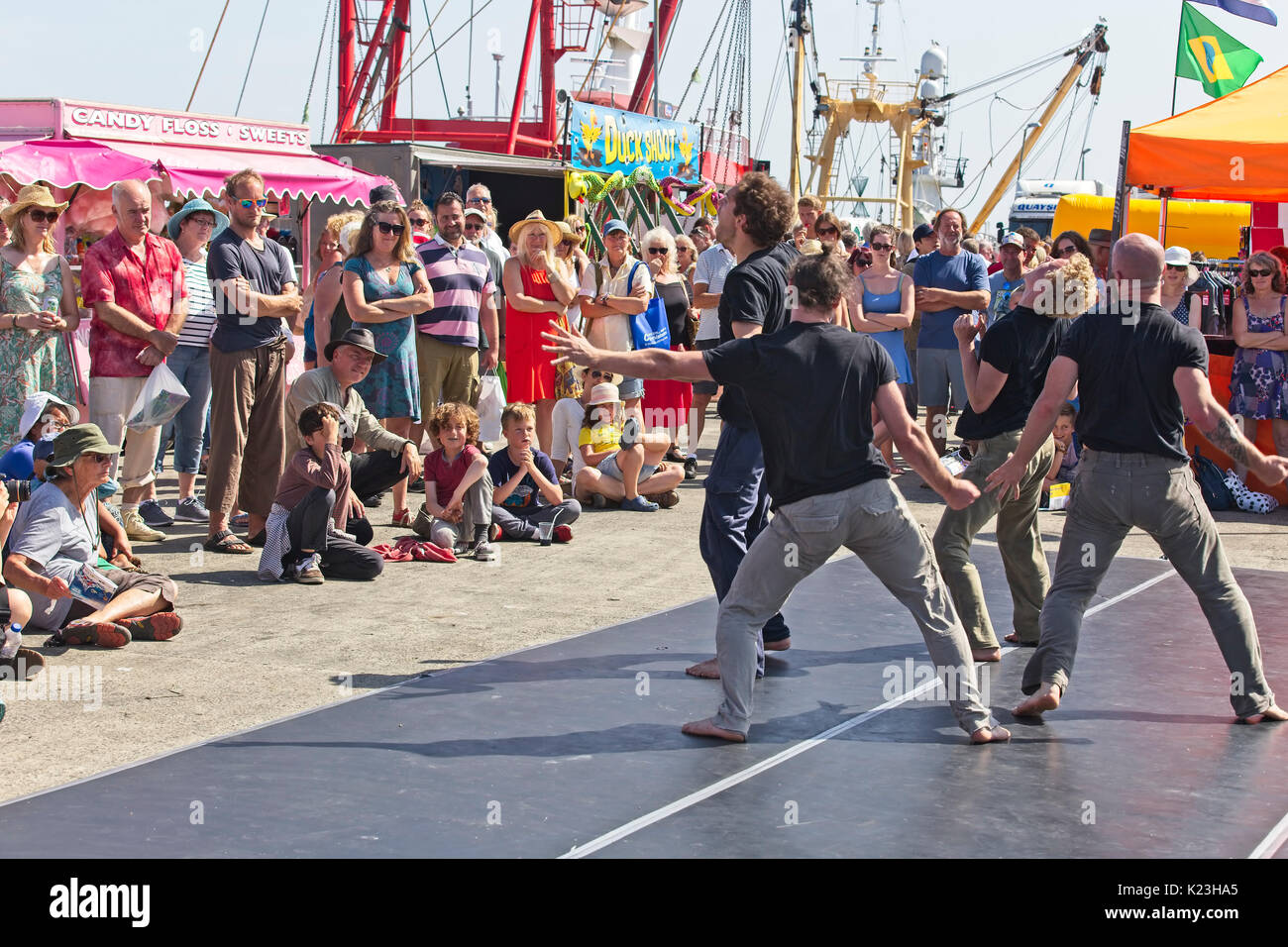 Newlyn, Cornwall, UK. 28th Aug, 2017. The dance troupe, 'James Wilton Dance', performing at the Newlyn Fish Festival, Newlyn, Cornwall, England, UK. Credit: tony mills/Alamy Live News Stock Photo