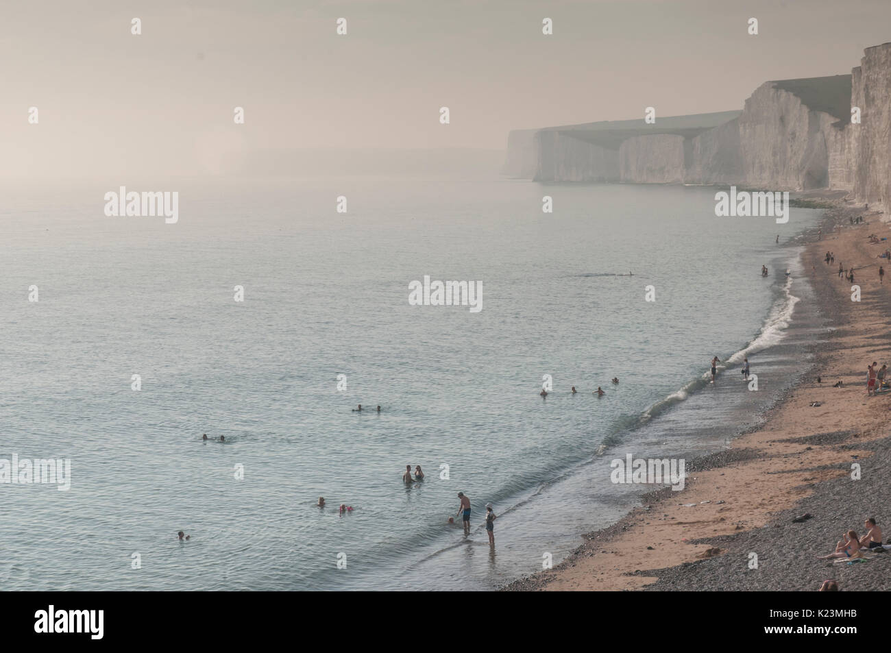 Birling Gap, East Sussex, UK. 28th Aug, 2017. Normality returns after yesterdays noxious cloud that remains unexplained as the harmless, normal, sea mist rolls in partly obscuring the Seven Sisters chalk cliffs. Yesterday the beach was evacuated and some 150 persons were treated in hospital. Stock Photo