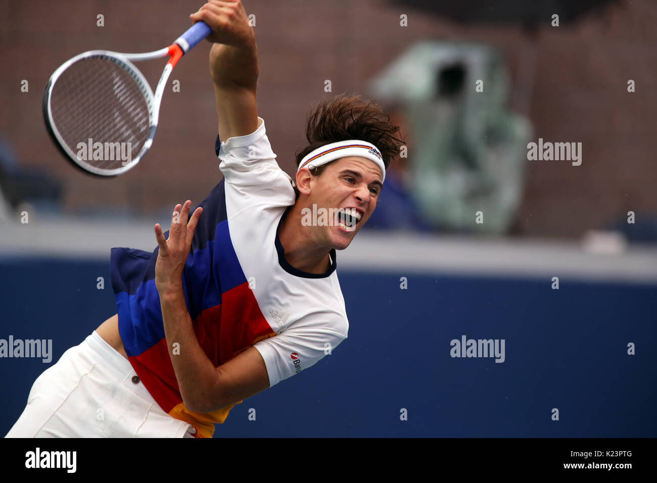 New York, United States. 29th Aug, 2017. US Open Tennis: New York, 29 August, 2017 -Dominic Thiem of Austria serving to Alex de Minaur of Australia during their first round match at the US Open in Flushing Meadows, New York. Credit: Adam Stoltman/Alamy Live News Stock Photo