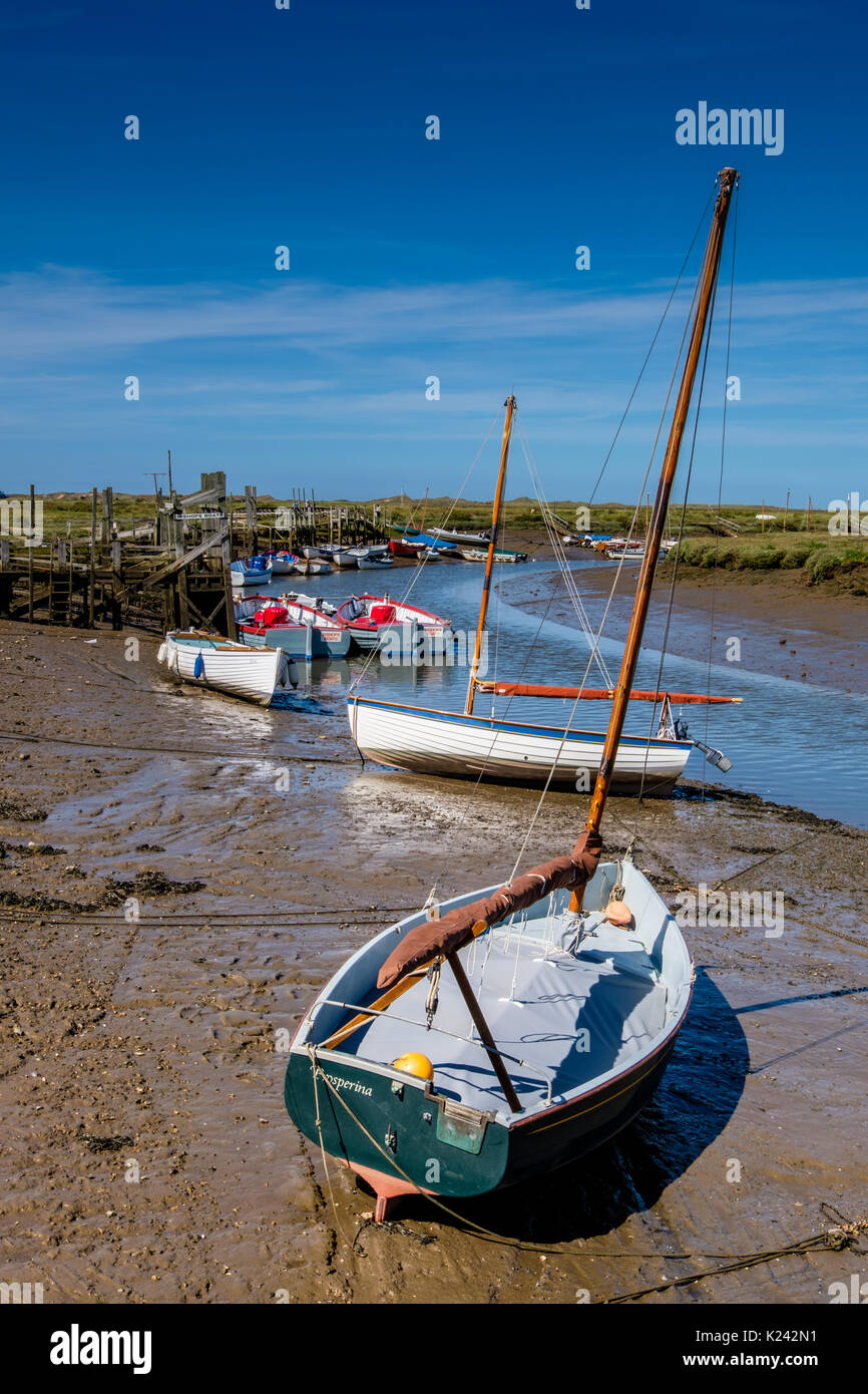 Boats beached on Morston Creek, Morston Quay, North Norfolk, UK Stock ...