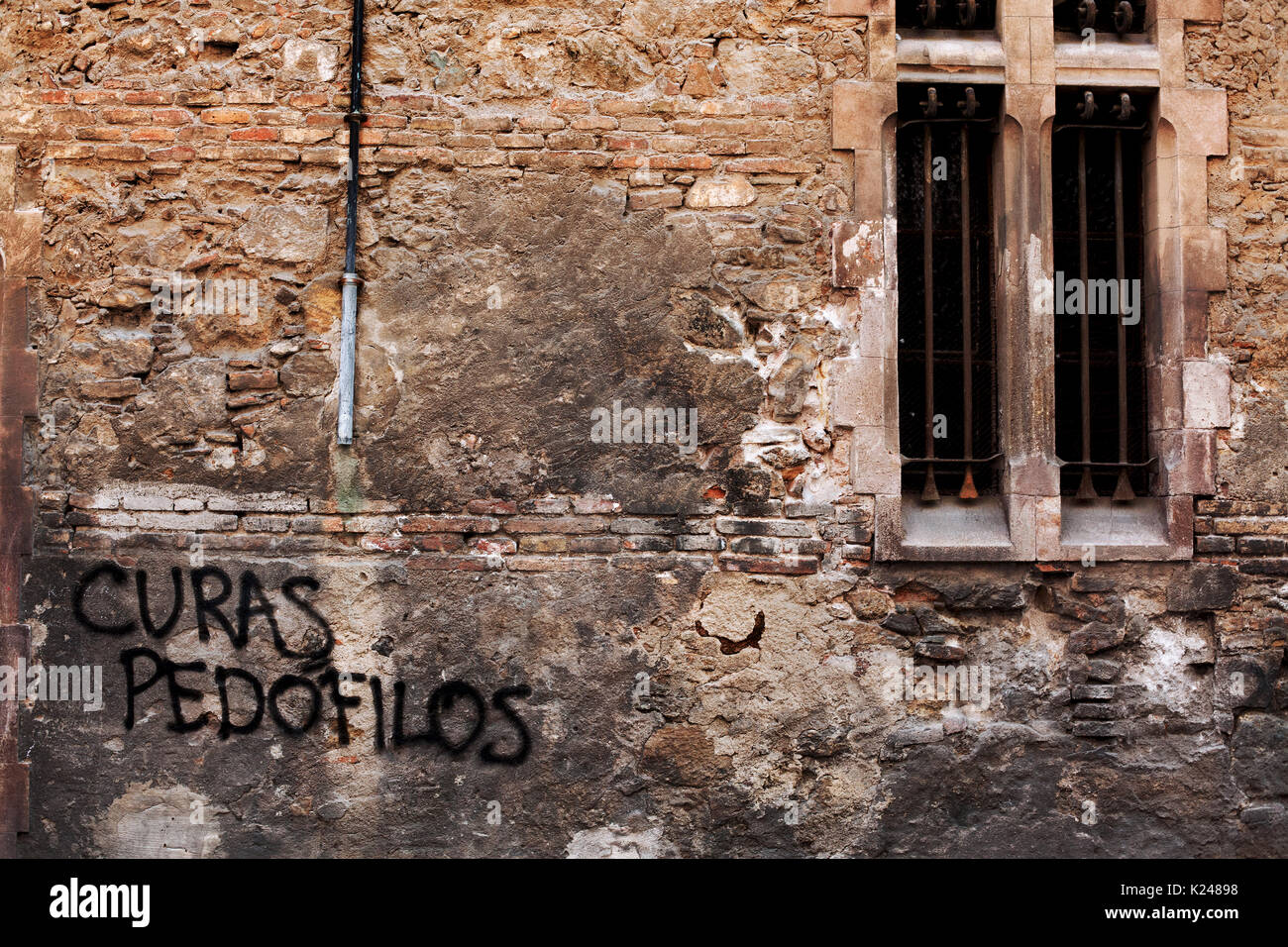 Paedophile priests' graffiti, Barcelona, Spain Stock Photo