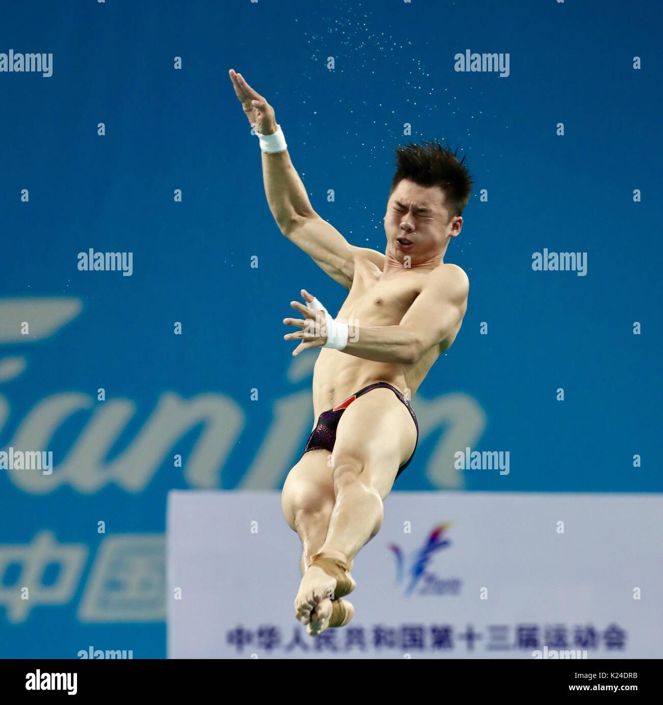 Tianjin. 28th Aug, 2017. Chen Aisen of Guangdong competes during the men's 10m platform final of Diving at the 13th Chinese National Games in north China's Tianjin Municipality, Aug. 28, 2017. Chen Aisen claimed the title with 613.55 points. Credit: Ding Xu/Xinhua/Alamy Live News Stock Photo