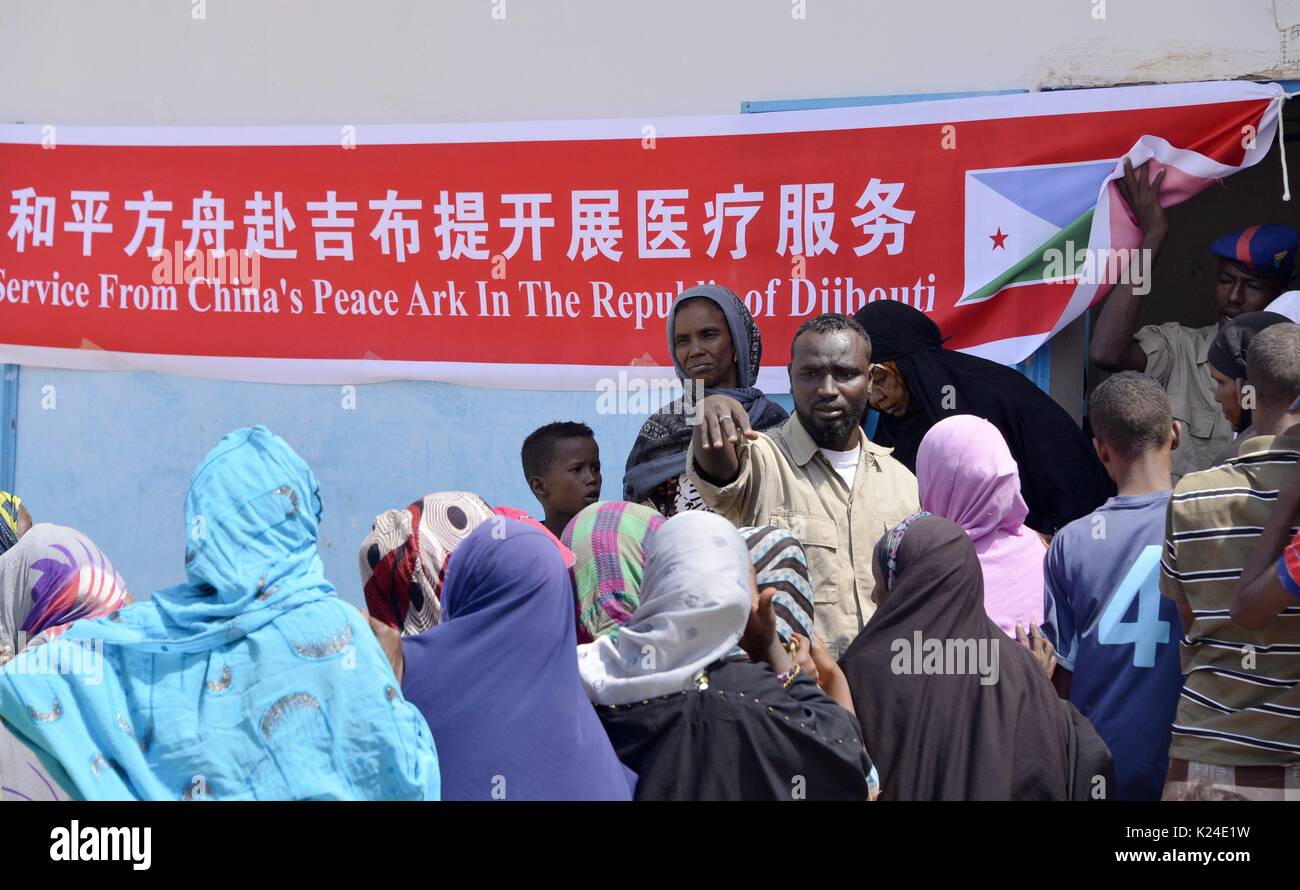 Djibouti, Djibouti. 25th Aug, 2017. Local people wait to receive free