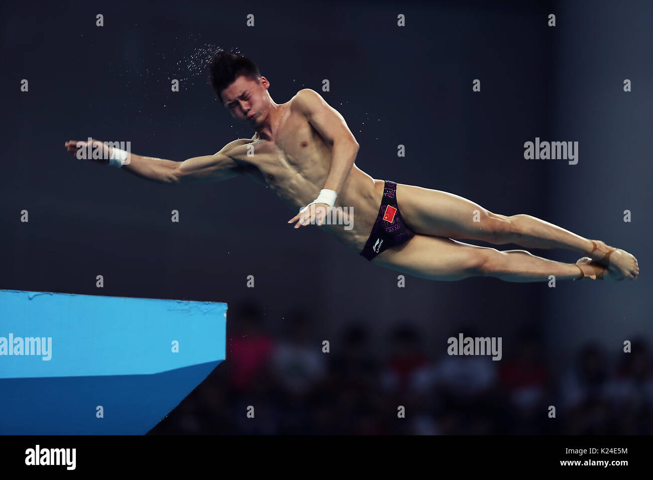 Tianjin. 28th Aug, 2017. Chen Aisen of Guangdong competes during the men's 10m platform final of Diving at the 13th Chinese National Games in north China's Tianjin Municipality, Aug. 28, 2017. Chen Aisen claimed the title with 613.55 points. Credit: Fei Maohua/Xinhua/Alamy Live News Stock Photo