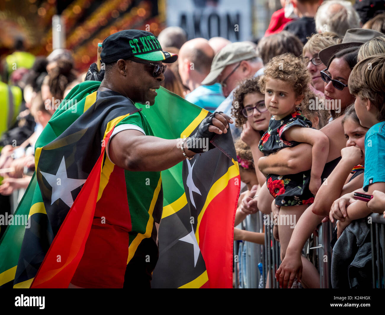 Leeds, UK. 28th August, 2017.  The 50th Leeds West Indian Carnival at Potternewton Park. The carnival was the first in the UK, in 1967, to incorporate all three essential elements of authentic West Indian carnival – costumes, music and a masquerade procession – it is Europe’s longest running Caribbean carnival parade. The event incorporates a colourful procession through the streets, a live music stage and street food and is geared towards all ages and cultures. Photo Bailey-Cooper Photography/Alamy Live News Stock Photo