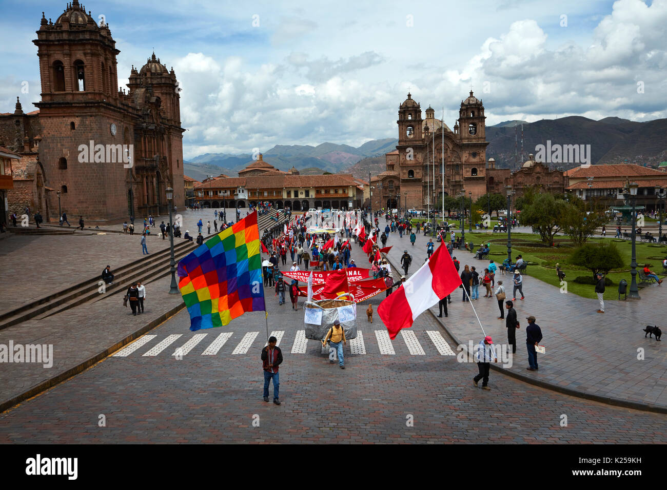 Protesters and Inca Wiphala Flag and Peruvian Flag, Plaza de Armas, Cusco, Peru, South America Stock Photo