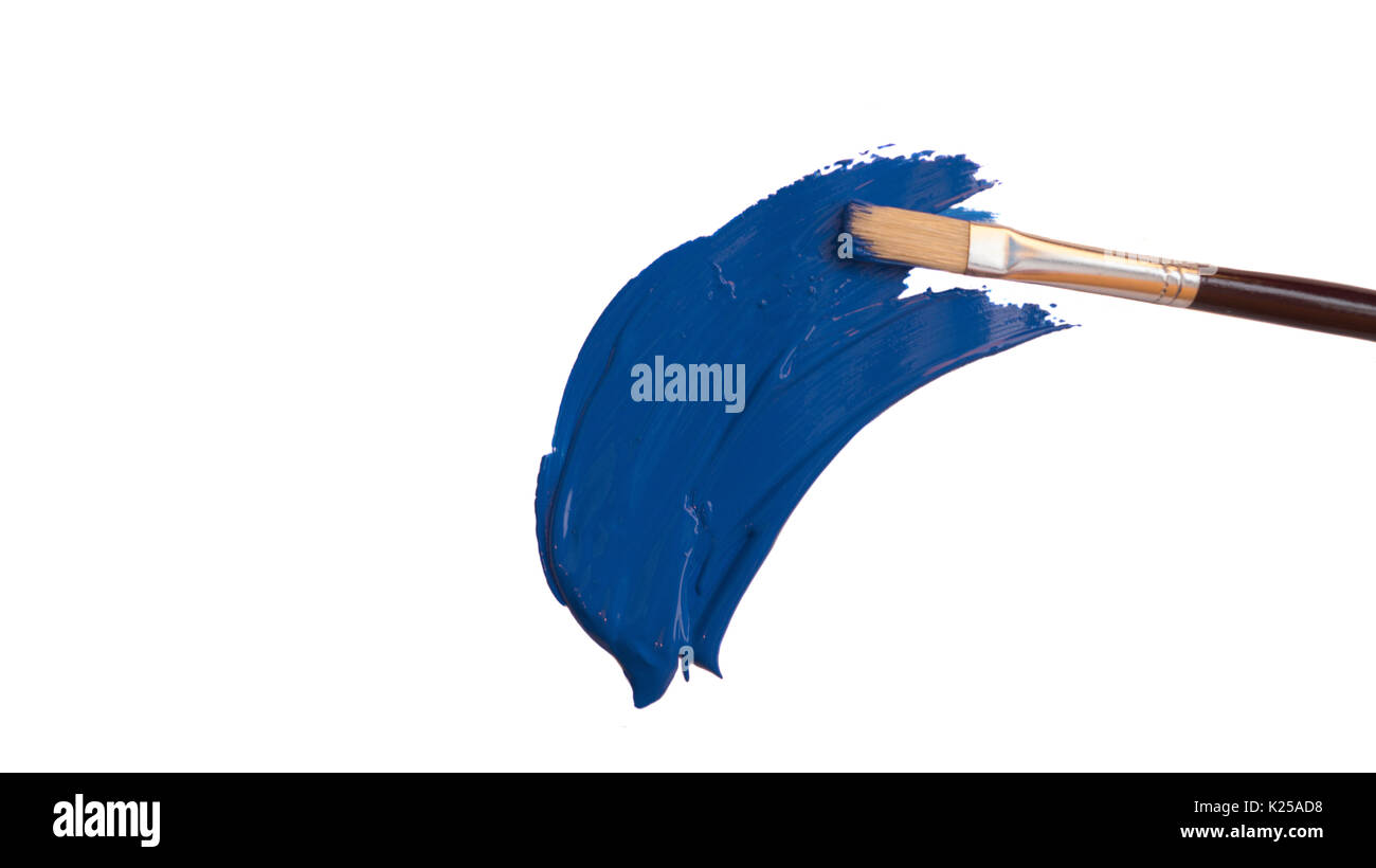 Paintbrush with blue paint on a isolated white background Stock Photo ...