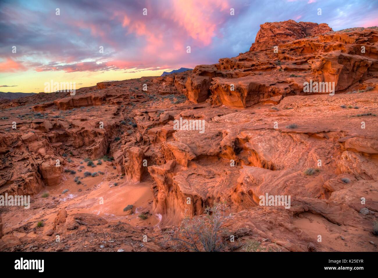 The sun sets over sandstone rock striations at the Little Finland formation at the Gold Butte National Monument September 27, 2016 near Mesquite, Nevada. Stock Photo