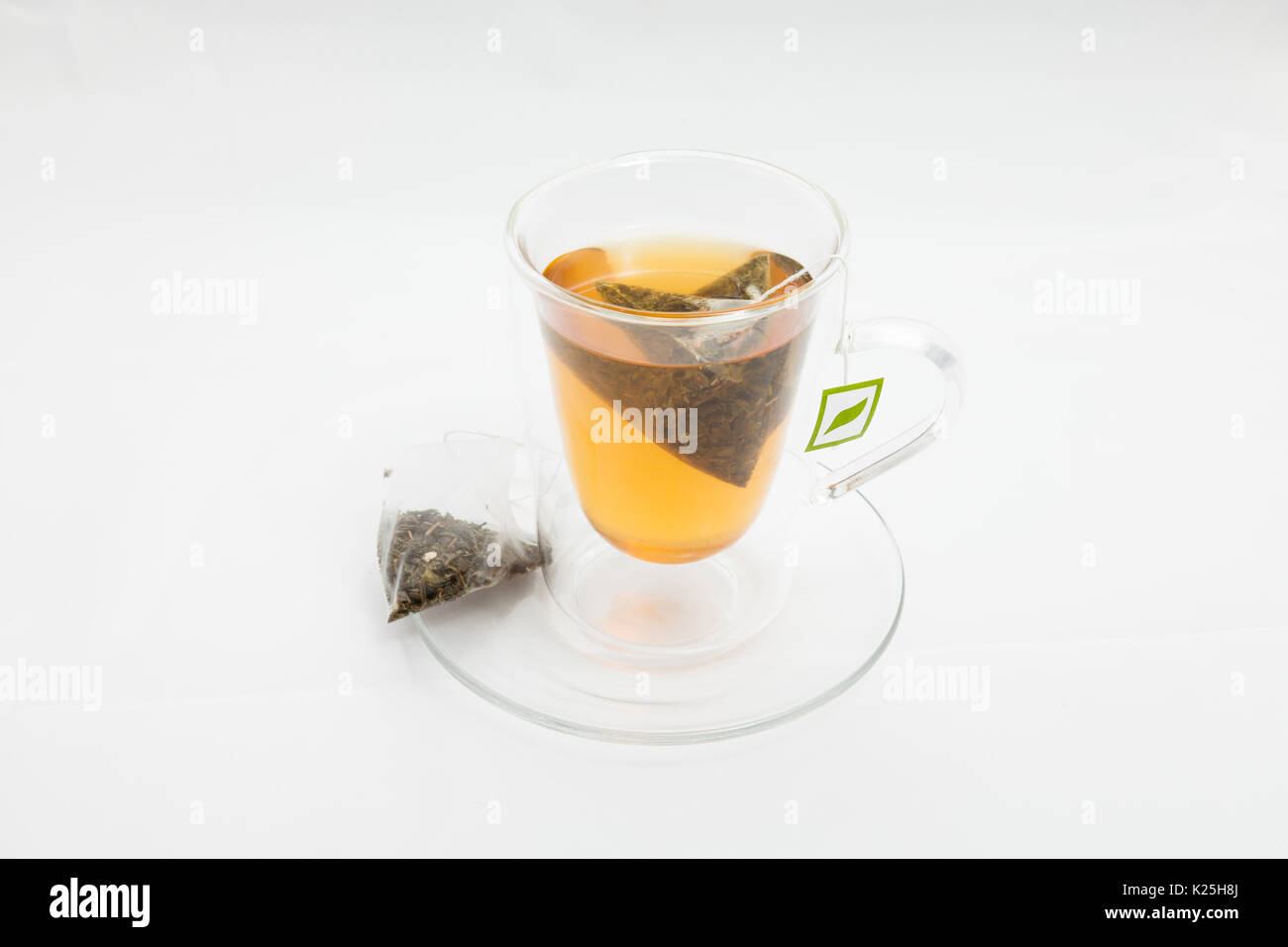 Tea in a glass with two tea bags Stock Photo Alamy