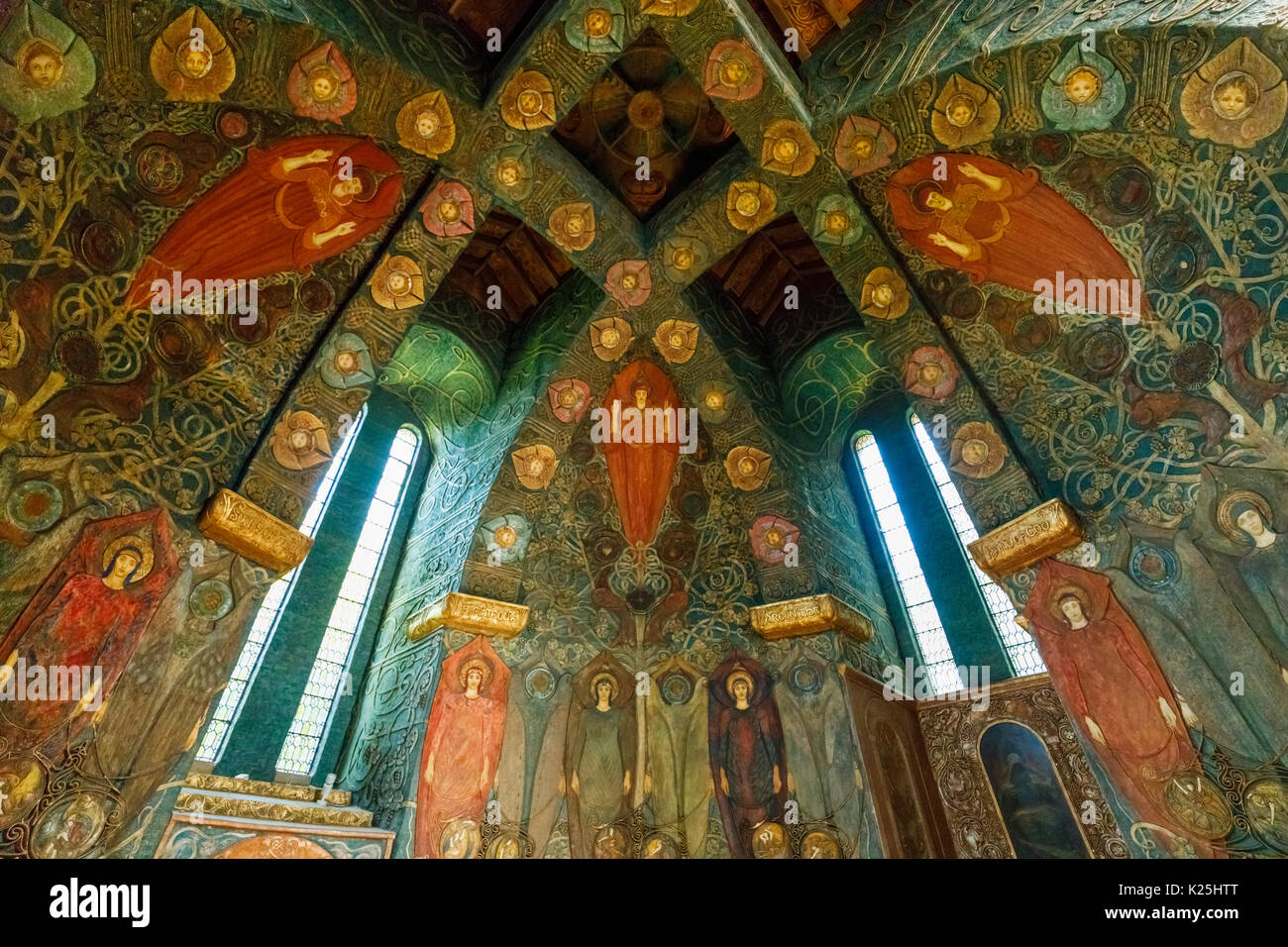 Arts & Crafts Movement style paintings in the Interior of Watts Cemetery Chapel, Compton, a village near Guildford, Surrey, south-east England, UK Stock Photo