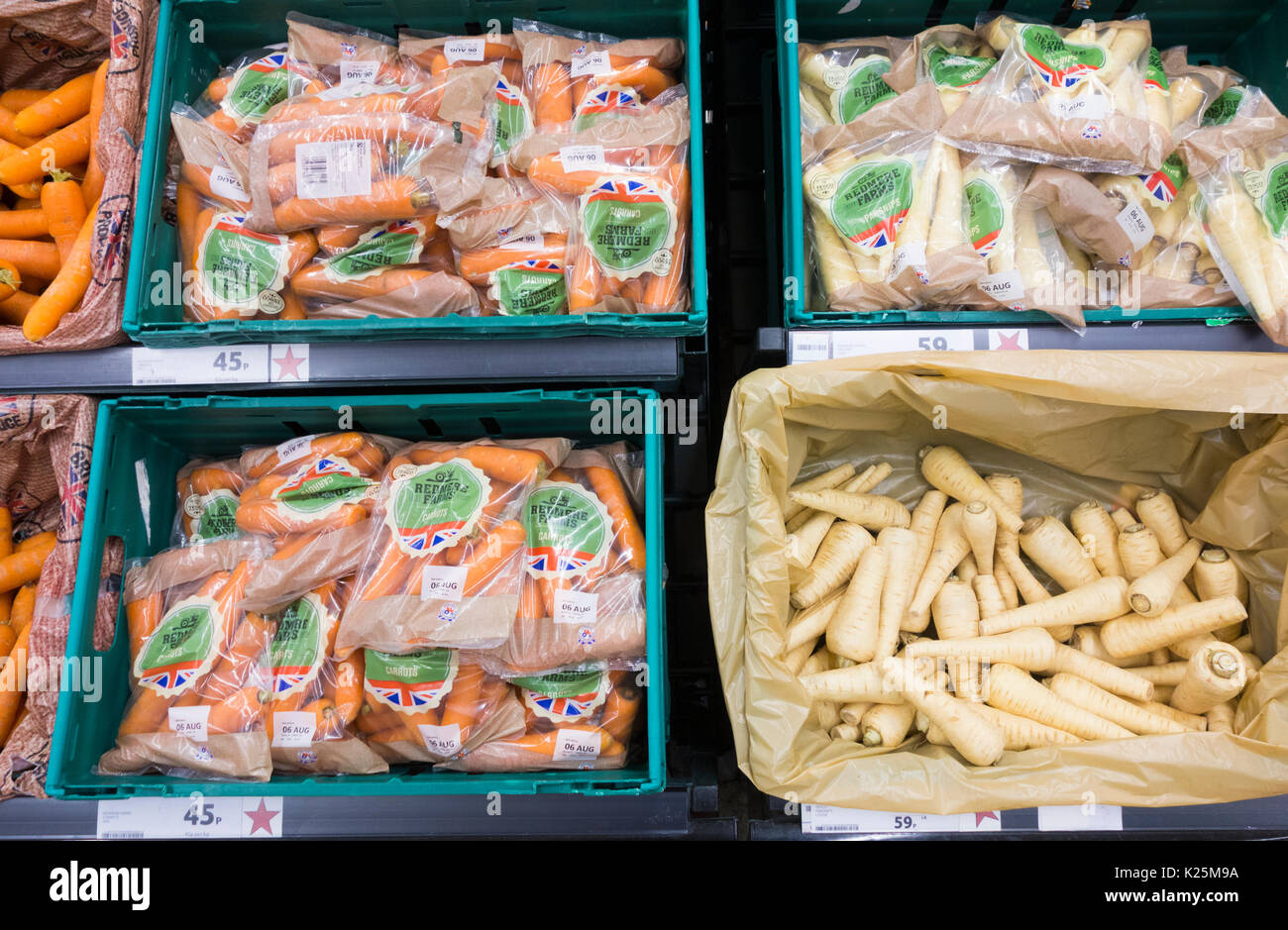 Carrots and Parsnips in Tesco supermarket. UK Stock Photo